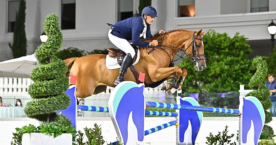 Equestrian Luis Pedro Biraben and horse jumping at World Equestrian Center Ocala