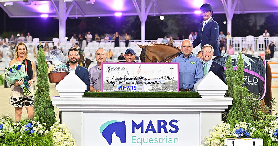 Equestrian Luis Pedro Biraben on horseback at the check presentation for the MARS Equestrian Grand Prix CSI3*