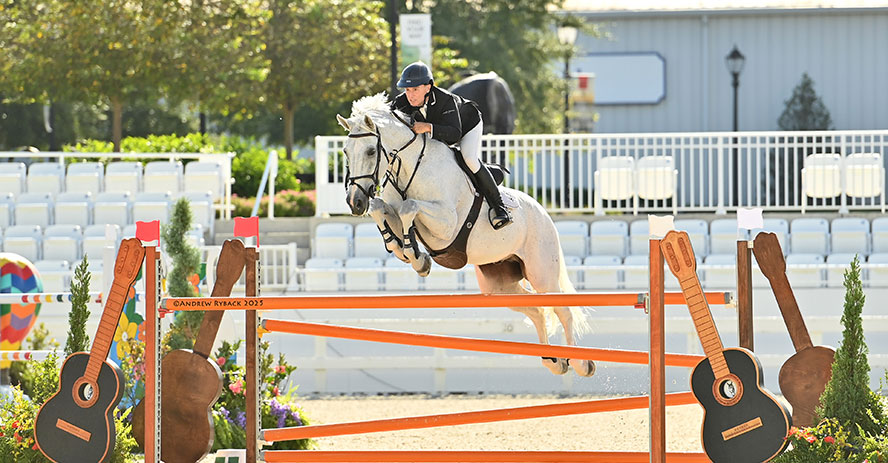 Equestrian Sharn Wordley and horse jumping at World Equestrian Center - Ocala