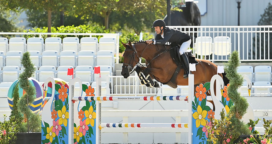 Equestrian Vicente Guillen and horse jump at World Equestrian Center Ocala