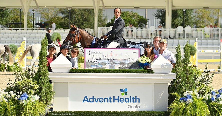 Equestrian Vicente Guillen and horse at the podium at World Equestrian Center - Ocala