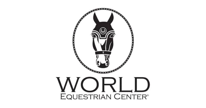 Logo of the World Equestrian Center featuring a stylized horse head inside an oval above the text 