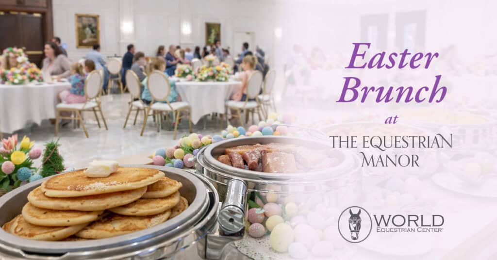 Stacks of pancakes and trays of food are set up in the foreground, with guests sitting at decorated tables for Easter Brunch at The Equestrian Manor, hosted by World Equestrian Center.