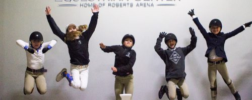 kids jumping on winners circle