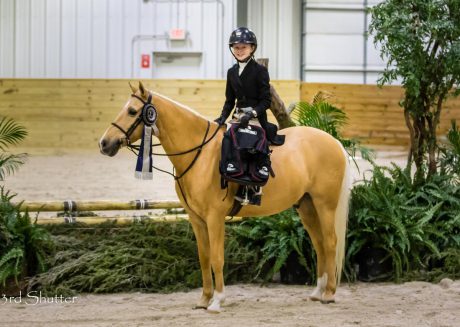 junior rider takes victory lap