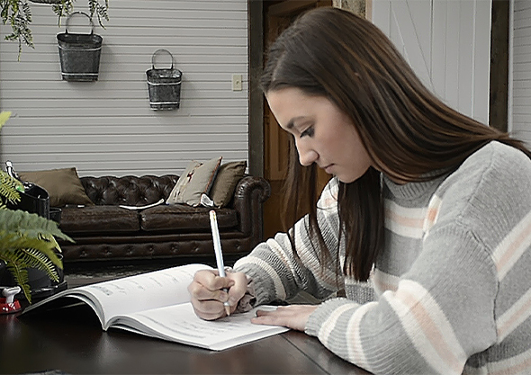 wilmington equestrian dragonfly academy student doing school work