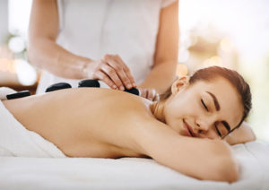 ocala equestrian spa woman getting stone massage