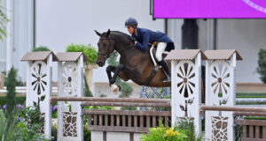 Rider Jenni McAllister and horse jump during Hunter Derby