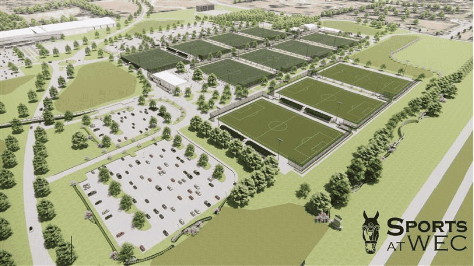 Aerial rendering of a sports complex featuring multiple soccer fields, parking lots, surrounding trees, and the logo "Sports at WEC" in the bottom right corner.
