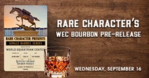 A glass of bourbon sits on a wooden surface next to a promo for Rare Character’s WEC Bourbon Pre-Release, featuring a bottle label and event date, Wednesday, September 16.